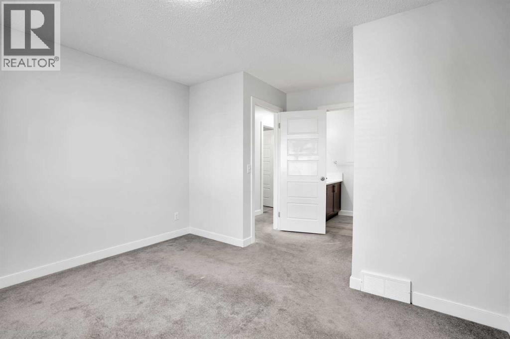 137 Pantego Lane Nw, Calgary, Alberta  T3K 0T1 - Photo 27 - A2262652