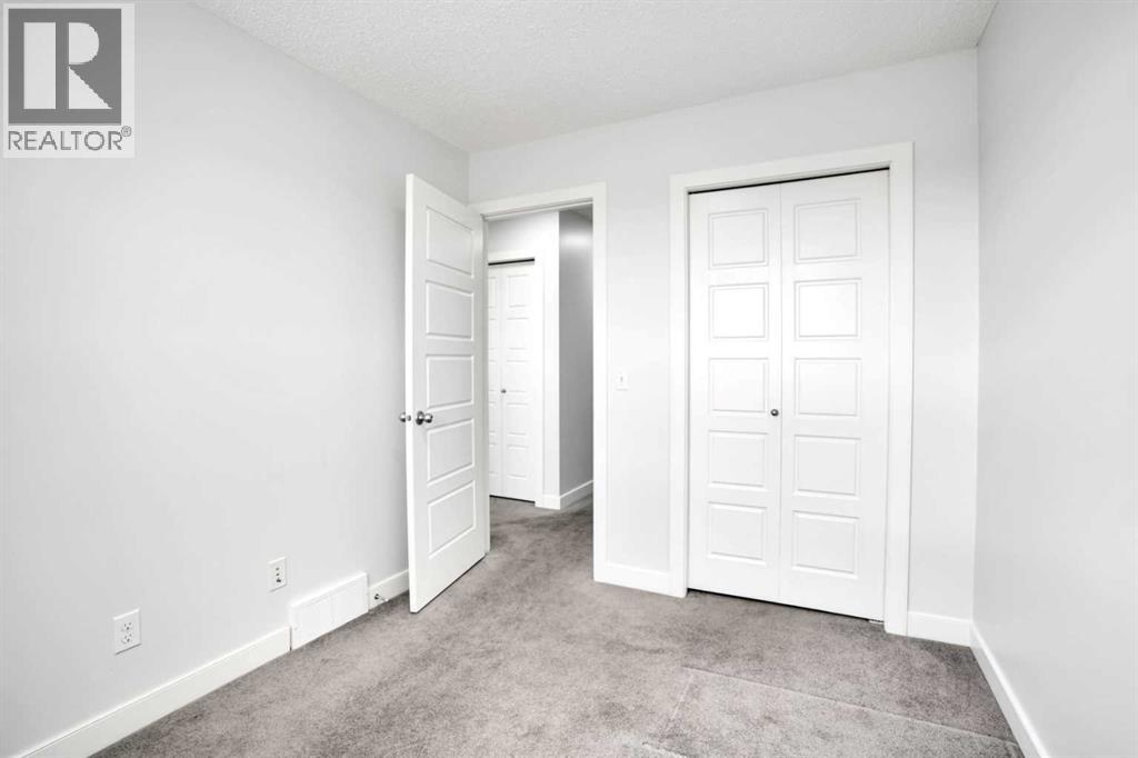 137 Pantego Lane Nw, Calgary, Alberta  T3K 0T1 - Photo 33 - A2262652