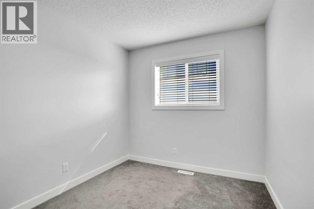 137 Pantego Lane Nw, Calgary, Alberta  T3K 0T1 - Photo 36 - A2262652