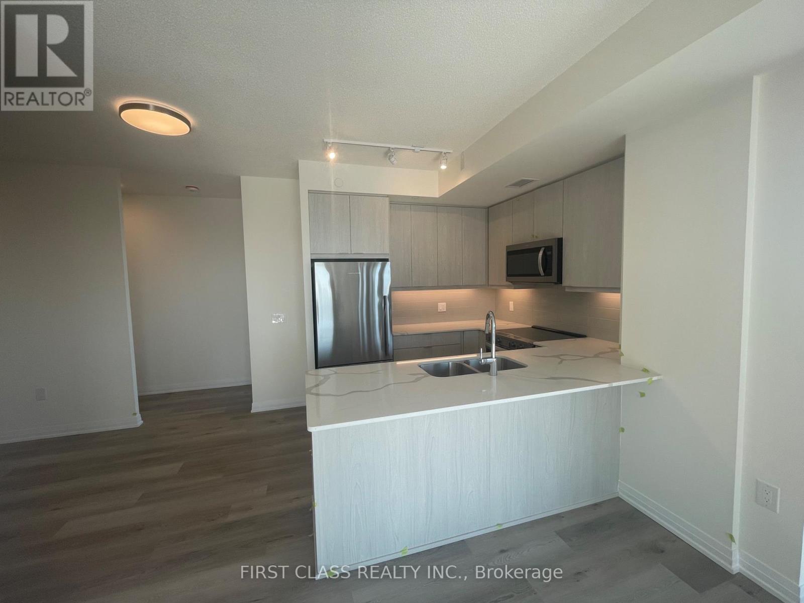 1201 - 15 Watergarden Drive, Mississauga, Ontario  L5R 1B2 - Photo 3 - W12459044