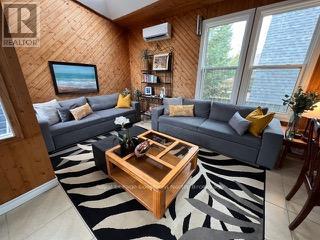 184 Dunkerron Avenue, Wasaga Beach, Ontario  L9Z 2G8 - Photo 4 - S12459071