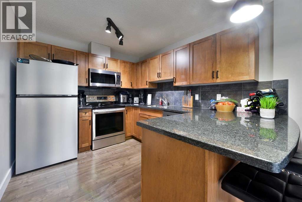 8, 301 Village Mews Sw, Calgary, Alberta  T3H 2L3 - Photo 7 - A2248553