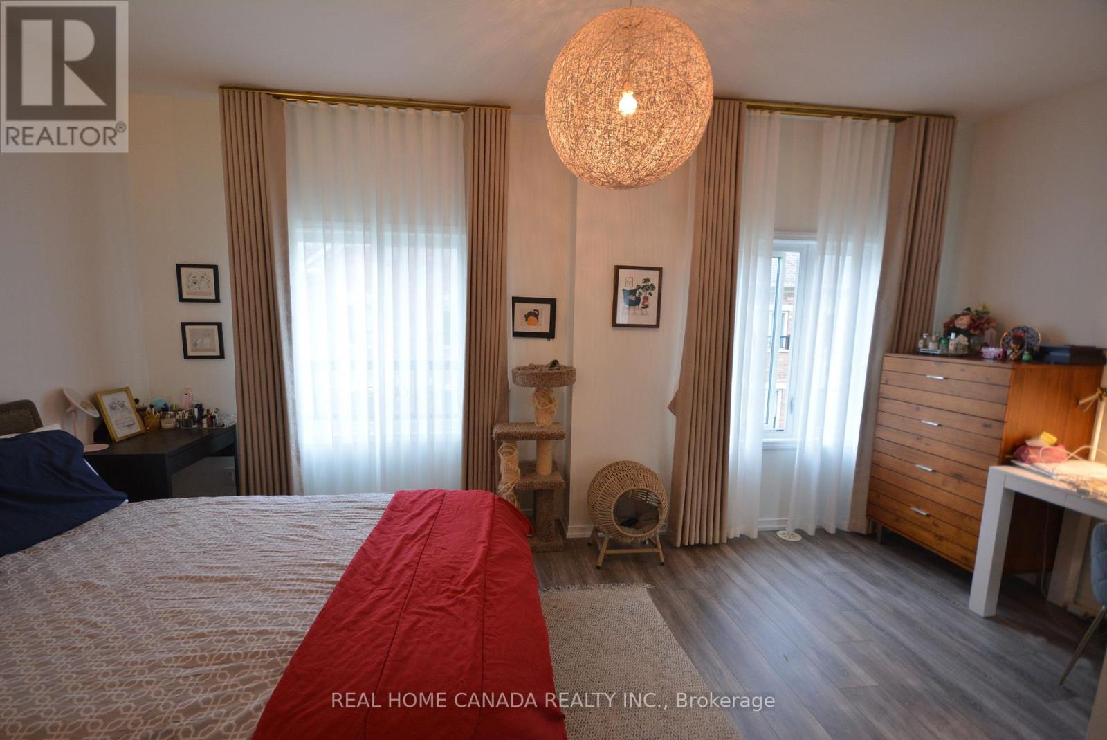 Th 14 - 25 Coneflower Crescent, Toronto, Ontario  M2R 0A5 - Photo 16 - C12459097