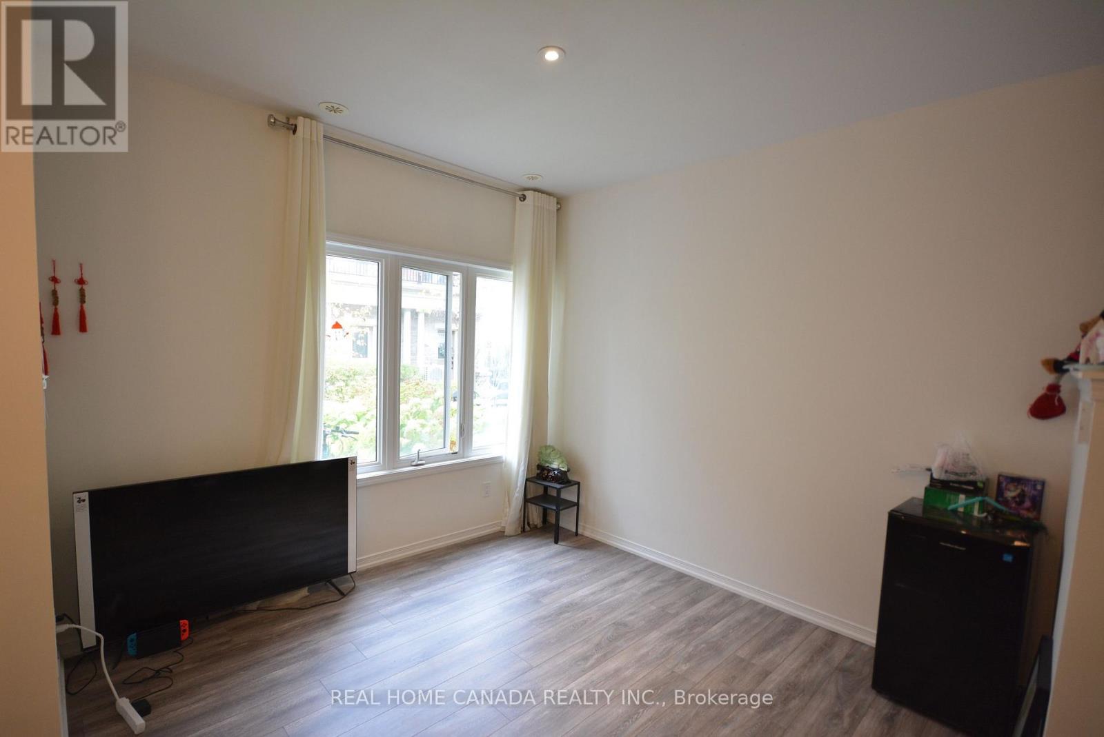 Th 14 - 25 Coneflower Crescent, Toronto, Ontario  M2R 0A5 - Photo 10 - C12459097