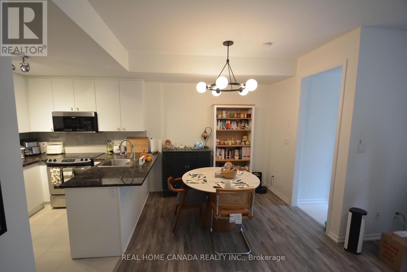 Th 14 - 25 Coneflower Crescent, Toronto, Ontario  M2R 0A5 - Photo 6 - C12459097