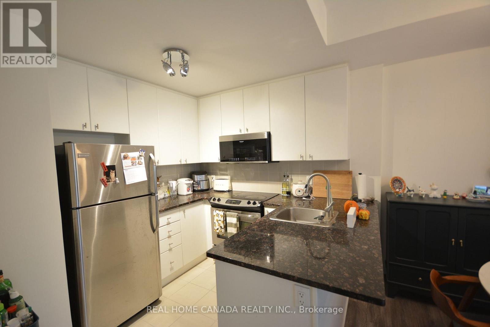 Th 14 - 25 Coneflower Crescent, Toronto, Ontario  M2R 0A5 - Photo 9 - C12459097