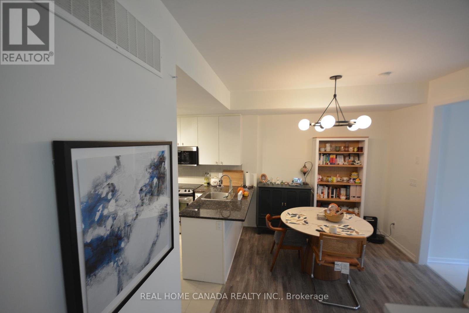 Th 14 - 25 Coneflower Crescent, Toronto, Ontario  M2R 0A5 - Photo 5 - C12459097