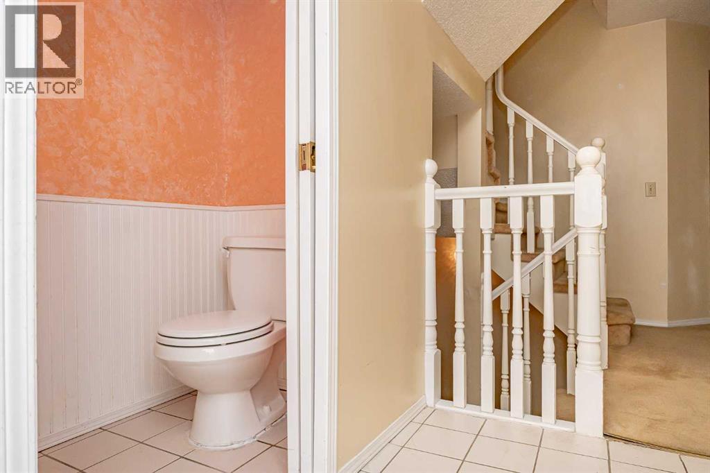 215 Coachway Lane Sw, Calgary, Alberta  T3H 2V9 - Photo 14 - A2262406