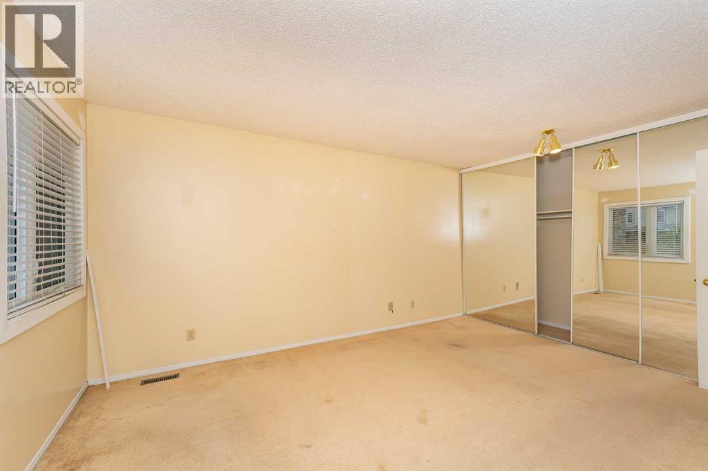 215 Coachway Lane Sw, Calgary, Alberta  T3H 2V9 - Photo 26 - A2262406