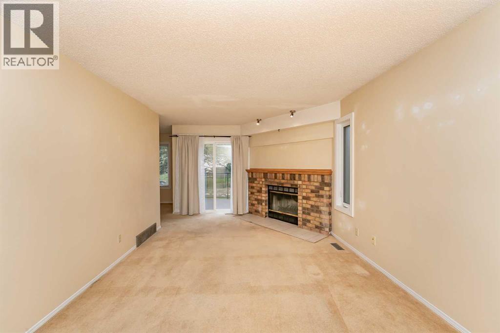 215 Coachway Lane Sw, Calgary, Alberta  T3H 2V9 - Photo 18 - A2262406