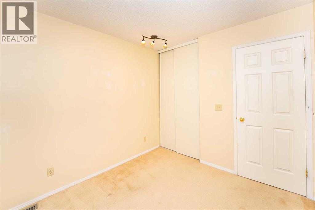 215 Coachway Lane Sw, Calgary, Alberta  T3H 2V9 - Photo 33 - A2262406