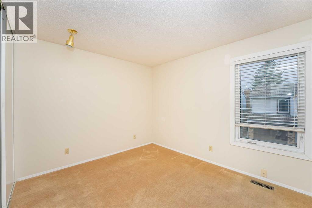 215 Coachway Lane Sw, Calgary, Alberta  T3H 2V9 - Photo 29 - A2262406