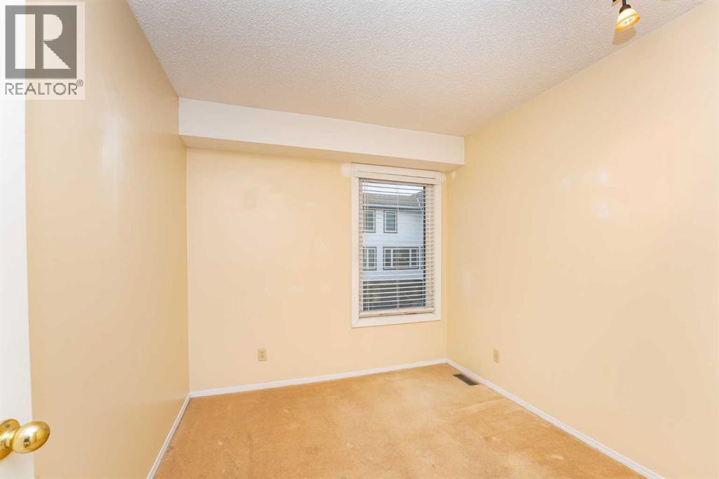 215 Coachway Lane Sw, Calgary, Alberta  T3H 2V9 - Photo 31 - A2262406