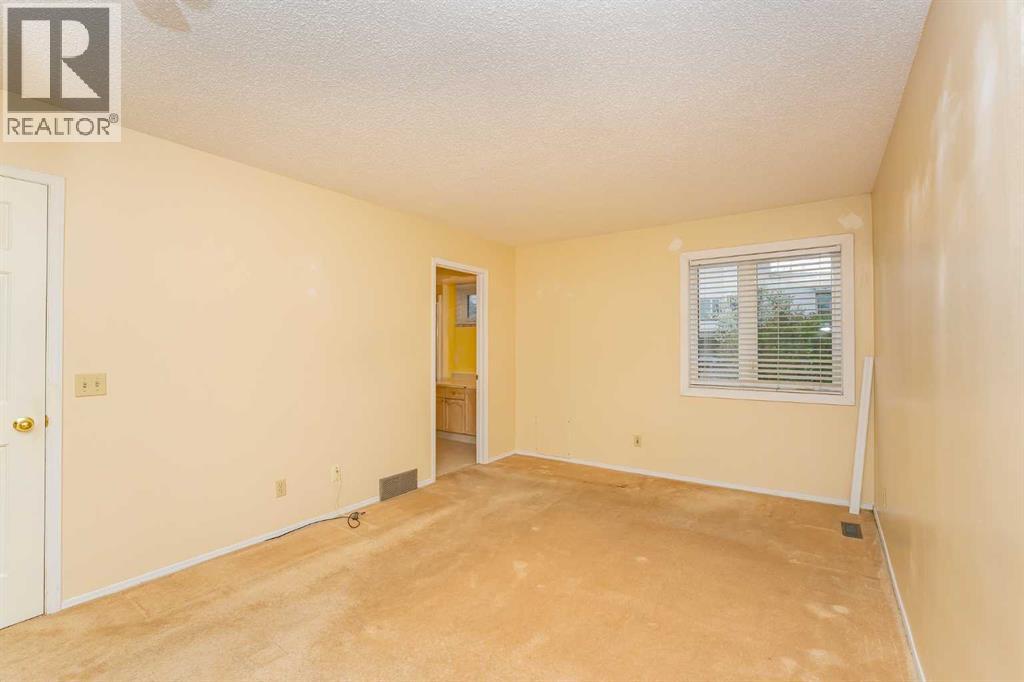 215 Coachway Lane Sw, Calgary, Alberta  T3H 2V9 - Photo 28 - A2262406