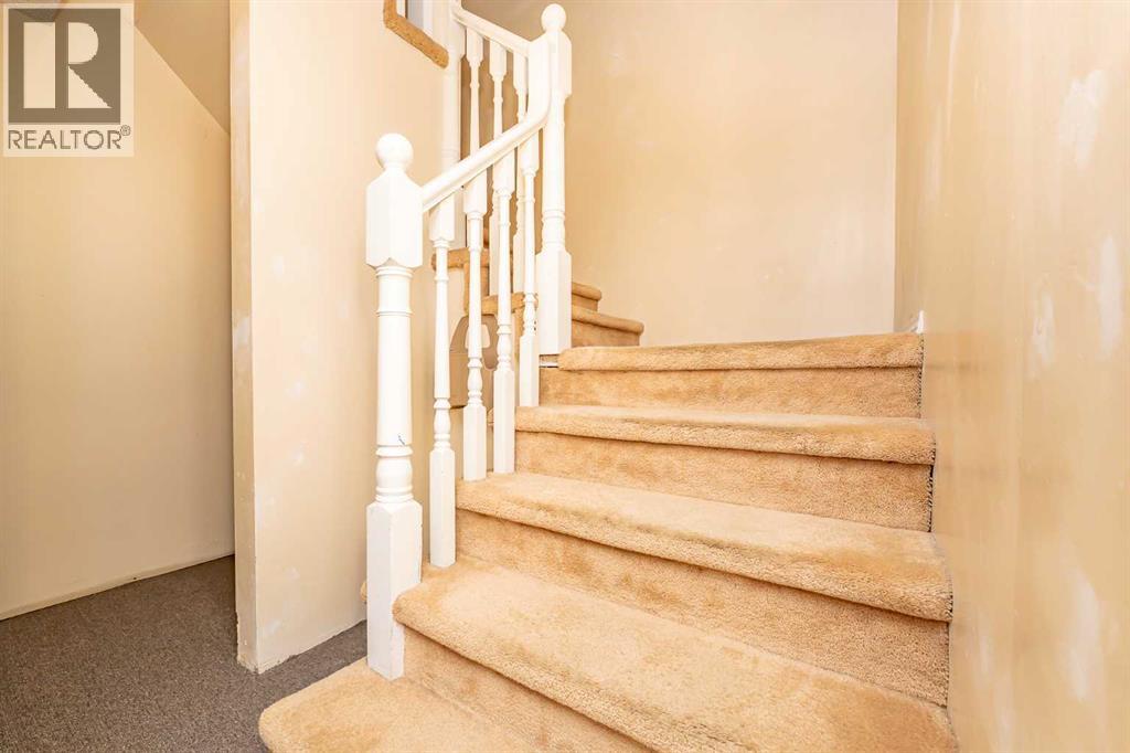 215 Coachway Lane Sw, Calgary, Alberta  T3H 2V9 - Photo 37 - A2262406