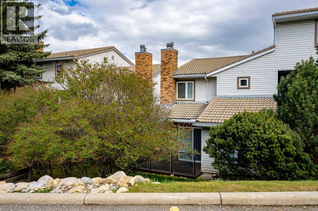 215 Coachway Lane Sw, Calgary, Alberta  T3H 2V9 - Photo 5 - A2262406