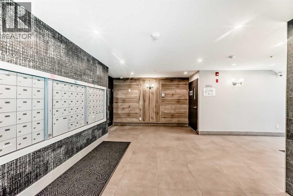 411, 138 Sage Valley Common Nw, Calgary, Alberta  T3R 1x7 - Photo 3 - A2263866