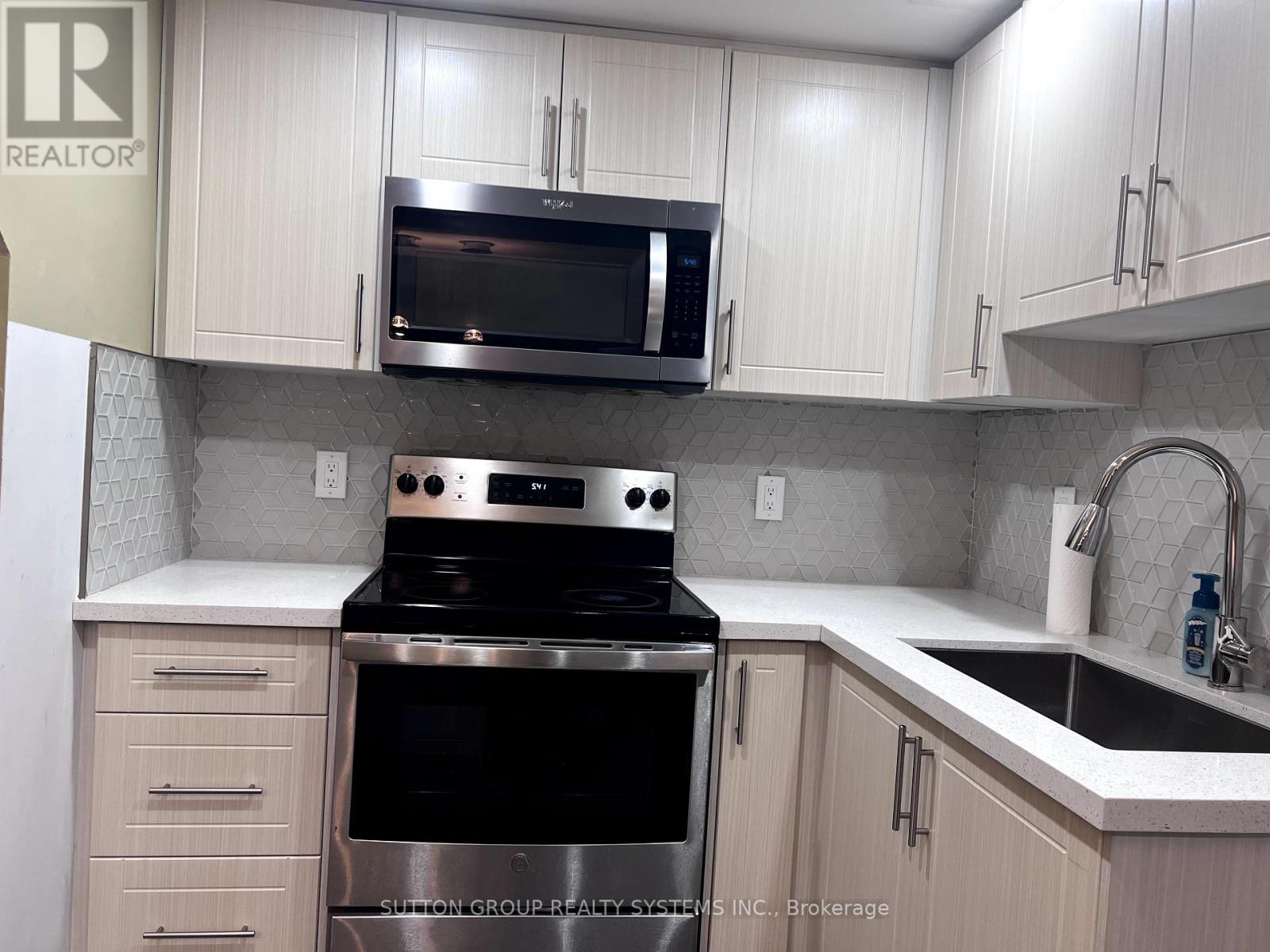 12 Wellesworth Drive, Toronto, Ontario  M9C 4P6 - Photo 2 - W12459372