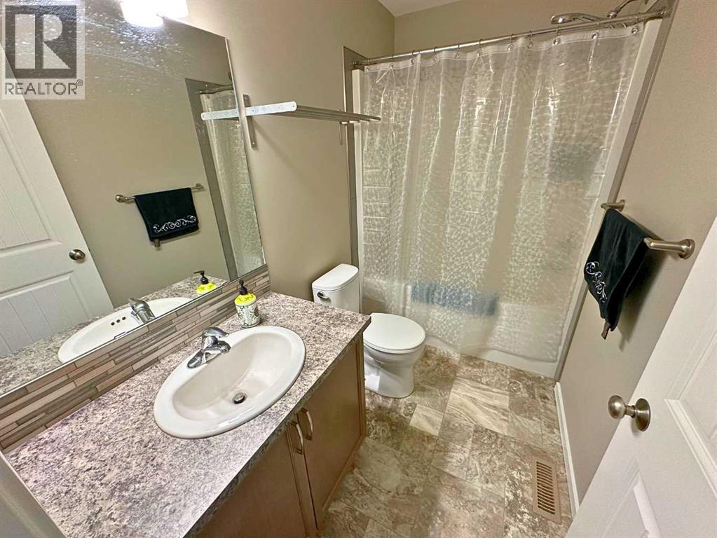 1004 Minto Street, Penhold, Alberta  T0M 1R0 - Photo 14 - A2259288