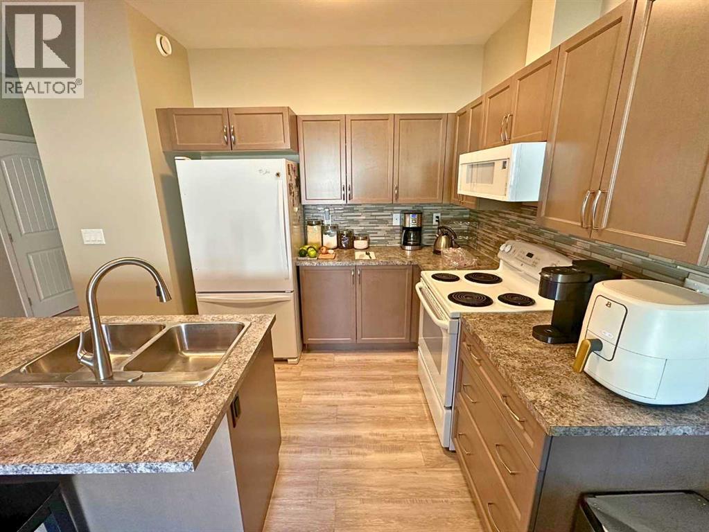 1004 Minto Street, Penhold, Alberta  T0M 1R0 - Photo 2 - A2259288