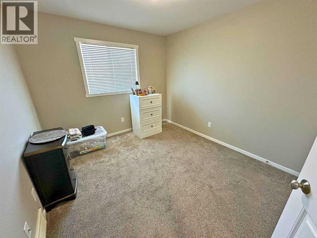 1004 Minto Street, Penhold, Alberta  T0M 1R0 - Photo 15 - A2259288