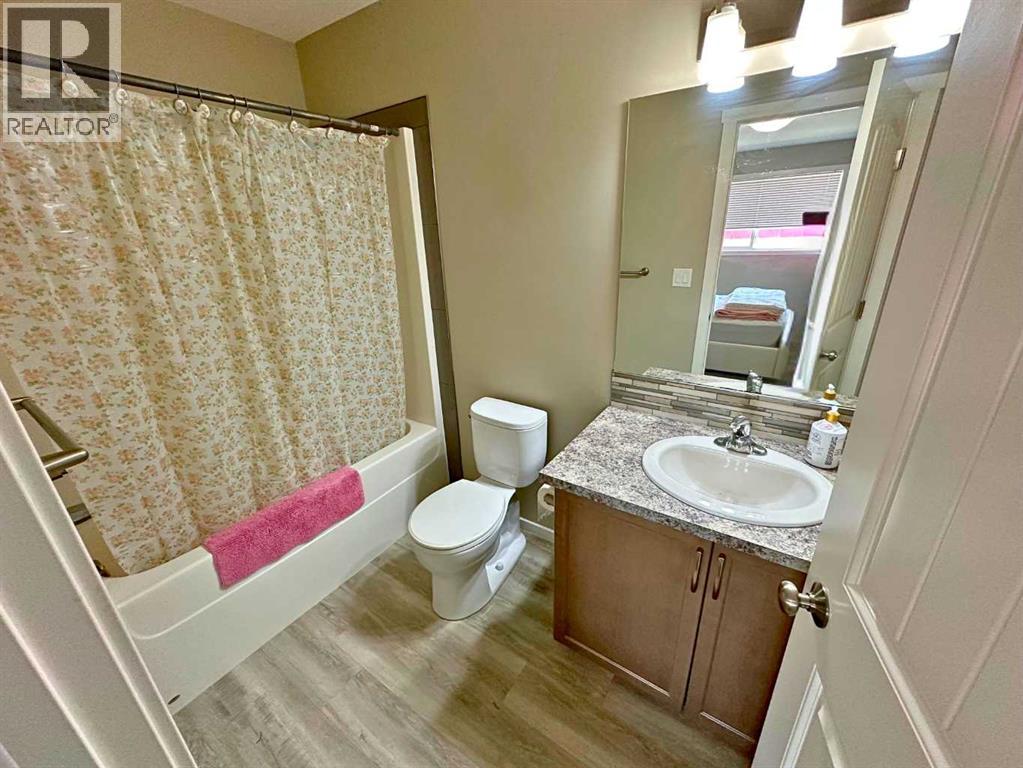 1004 Minto Street, Penhold, Alberta  T0M 1R0 - Photo 11 - A2259288