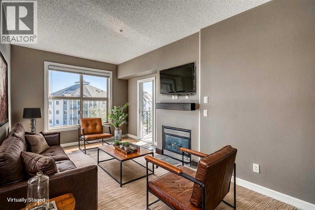 415, 88 Arbour Lake Road Nw, Calgary, Alberta  T3G 0C2 - Photo 1 - A2238543