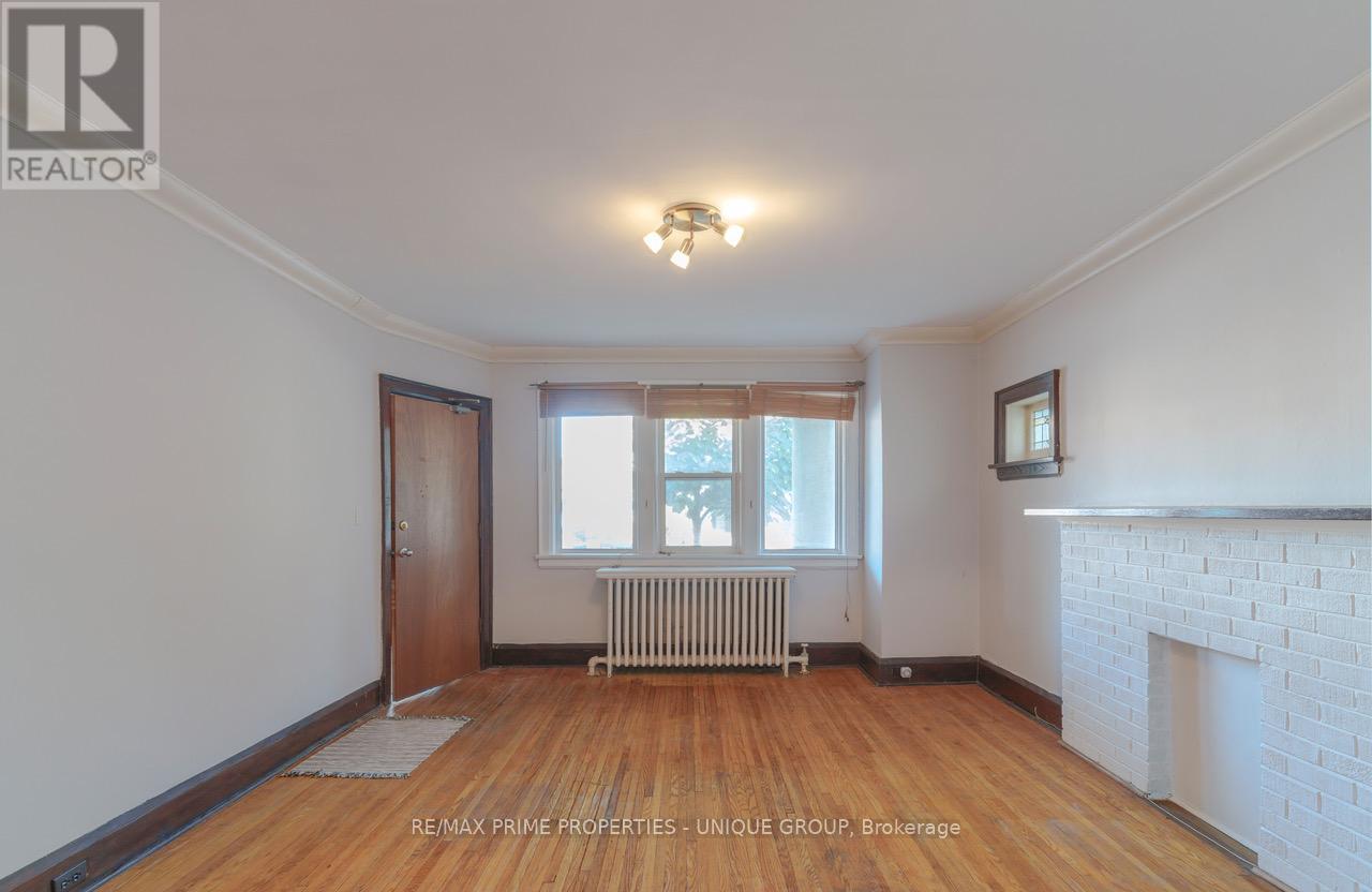 1 Bonfield Avenue, Toronto, Ontario  M4E 1B9 - Photo 3 - E12459818
