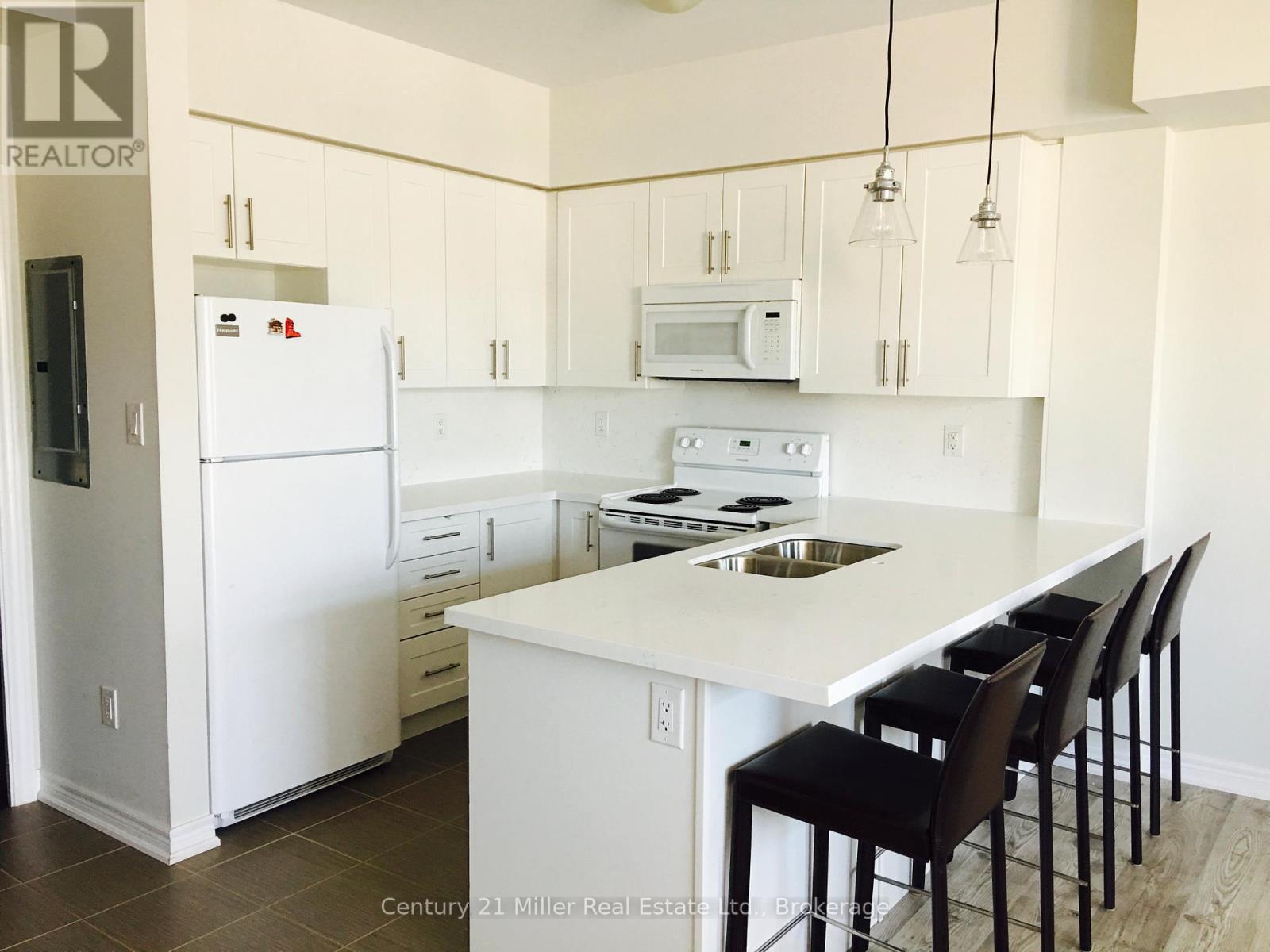 306 - 2326 Taunton Road, Oakville, Ontario  L6H 0L3 - Photo 2 - W12460010