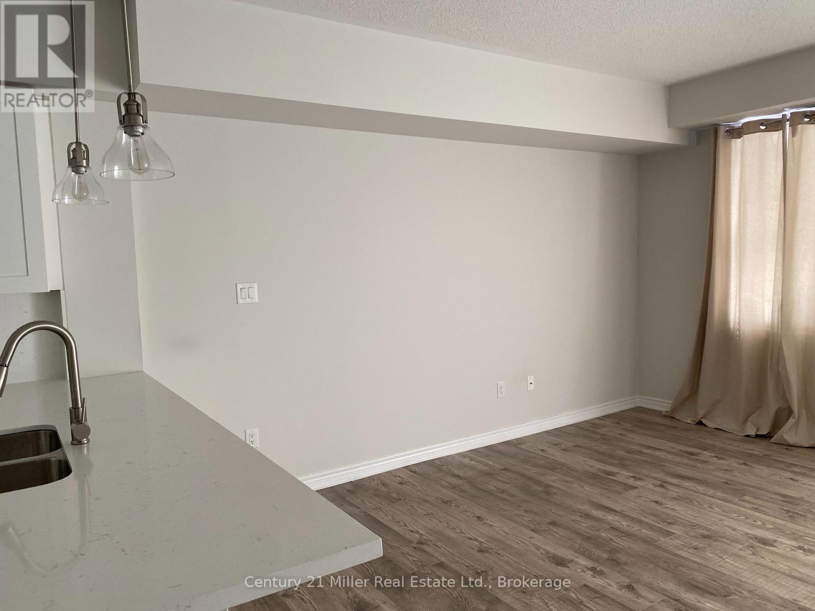 306 - 2326 Taunton Road, Oakville, Ontario  L6H 0L3 - Photo 4 - W12460010