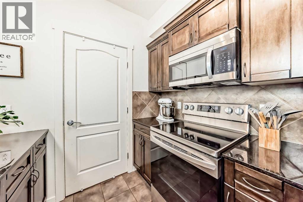 208, 141 Mountain Street, Cochrane, Alberta  T4C 1Z5 - Photo 9 - A2239617