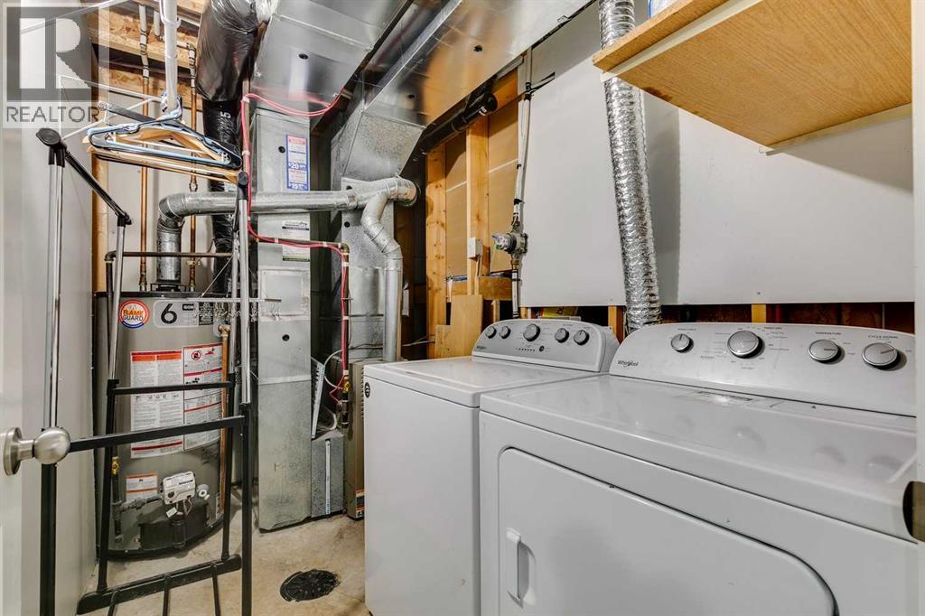 51 Spring Meadows Bay, Okotoks, Alberta  T1S 2G8 - Photo 30 - A2259710