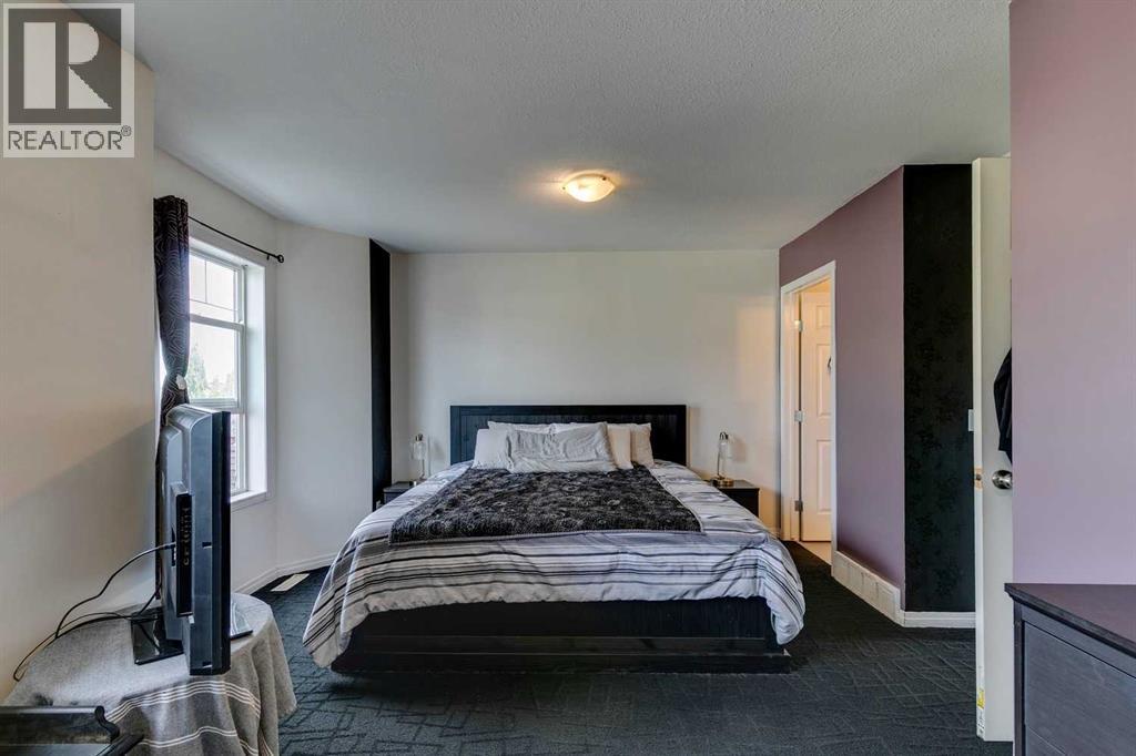 51 Spring Meadows Bay, Okotoks, Alberta  T1S 2G8 - Photo 19 - A2259710