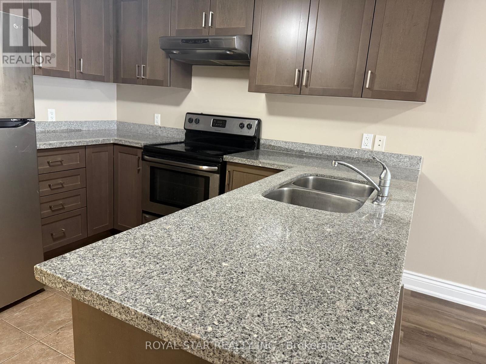 301 - 64 Frederick Drive, Guelph, Ontario  N1L 0P3 - Photo 2 - X12452708