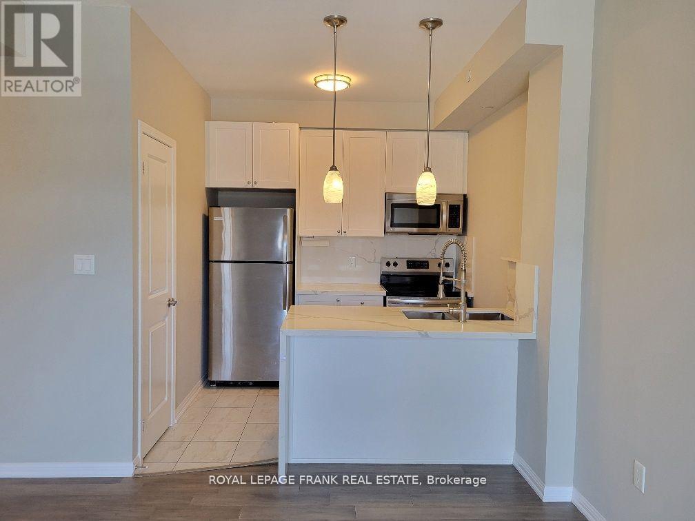 303 - 80 Aspen Springs Drive, Clarington, Ontario  L1C 0V4 - Photo 2 - E12460441