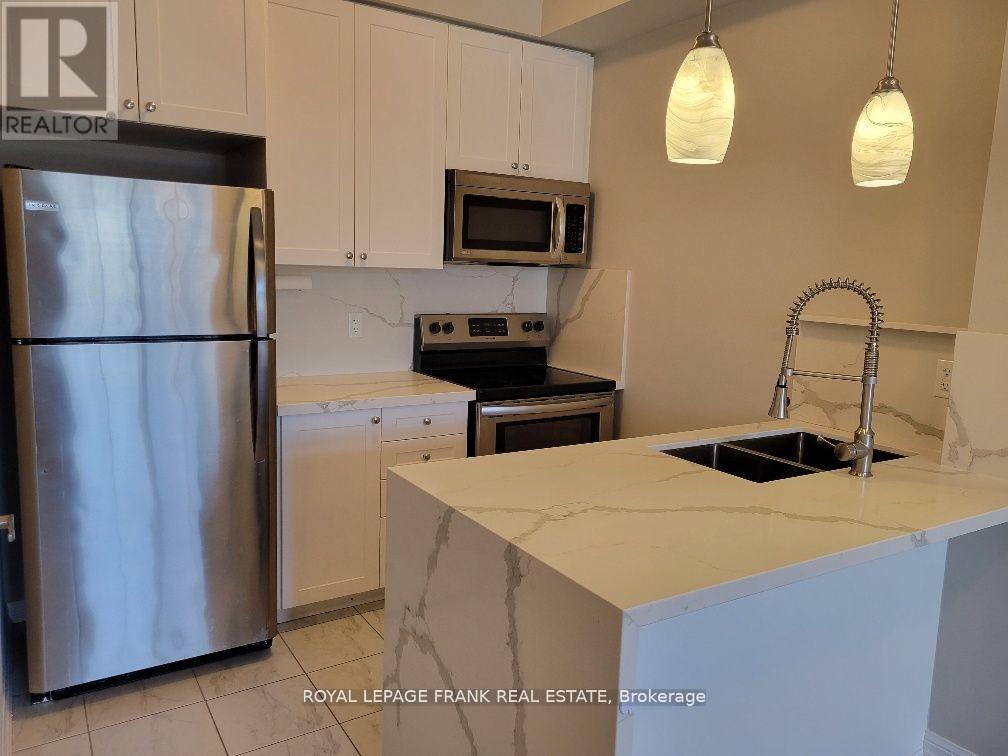 303 - 80 Aspen Springs Drive, Clarington, Ontario  L1C 0V4 - Photo 3 - E12460441