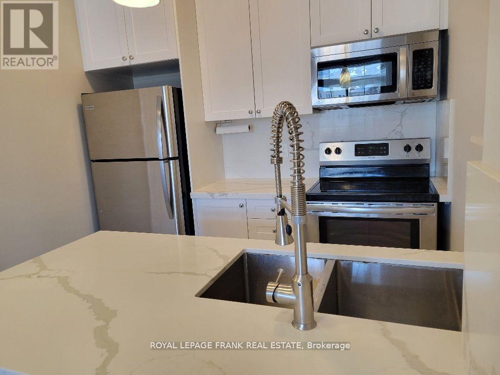 303 - 80 Aspen Springs Drive, Clarington, Ontario  L1C 0V4 - Photo 4 - E12460441