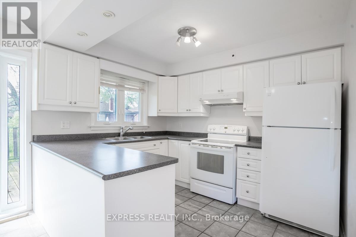 16 Donewen Court, Toronto, Ontario  M4A 1P8 - Photo 6 - C12460368