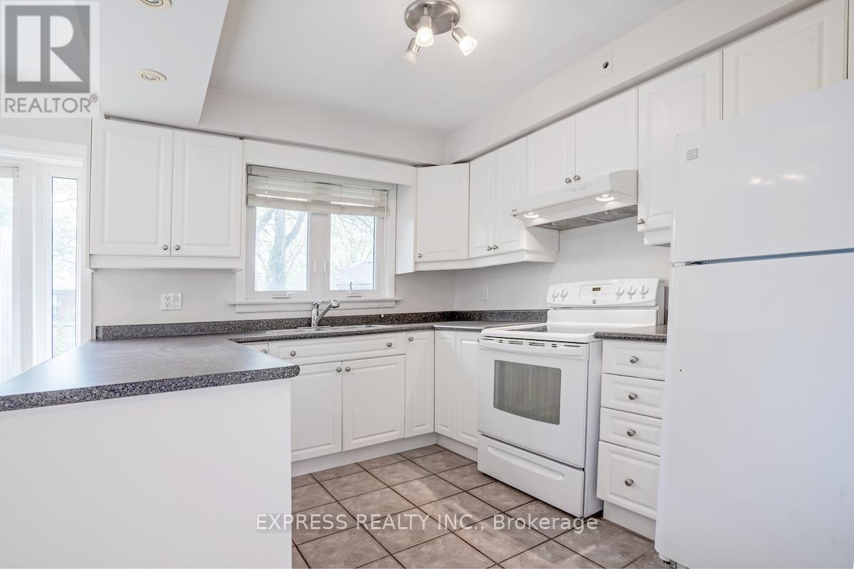 16 Donewen Court, Toronto, Ontario  M4A 1P8 - Photo 7 - C12460368