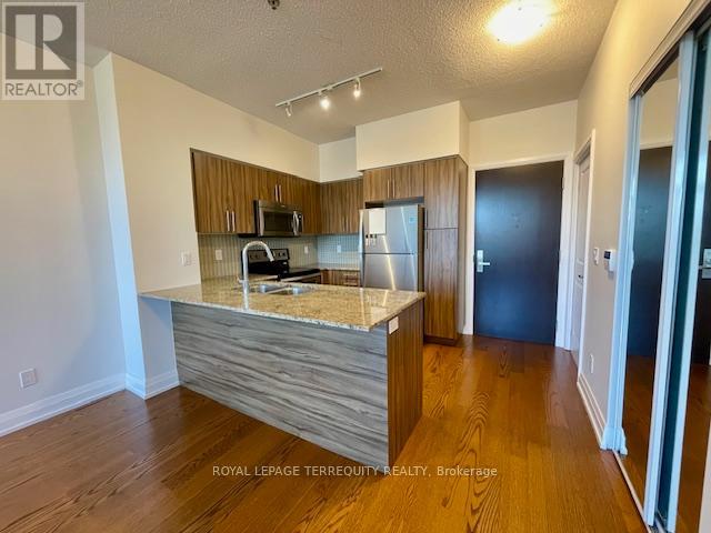 323 - 65 Speers Road, Oakville, Ontario  L6K 0J1 - Photo 4 - W12460611