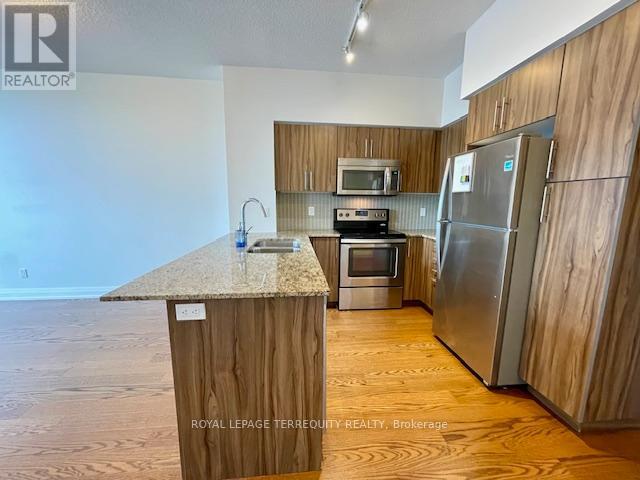 323 - 65 Speers Road, Oakville, Ontario  L6K 0J1 - Photo 7 - W12460611