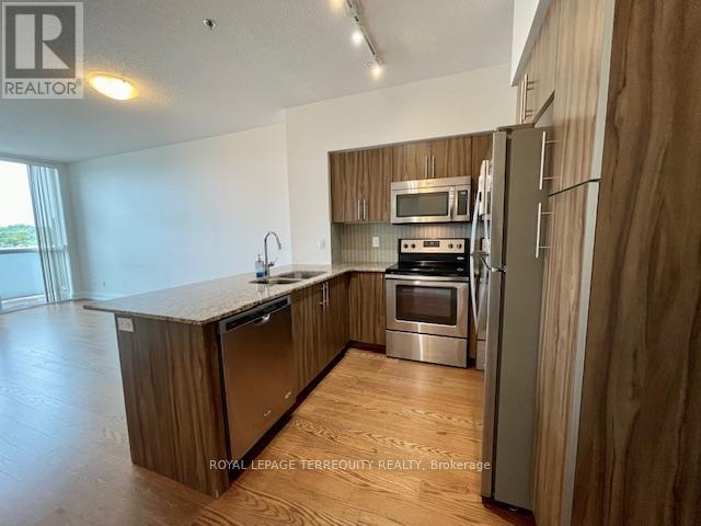 323 - 65 Speers Road, Oakville, Ontario  L6K 0J1 - Photo 8 - W12460611
