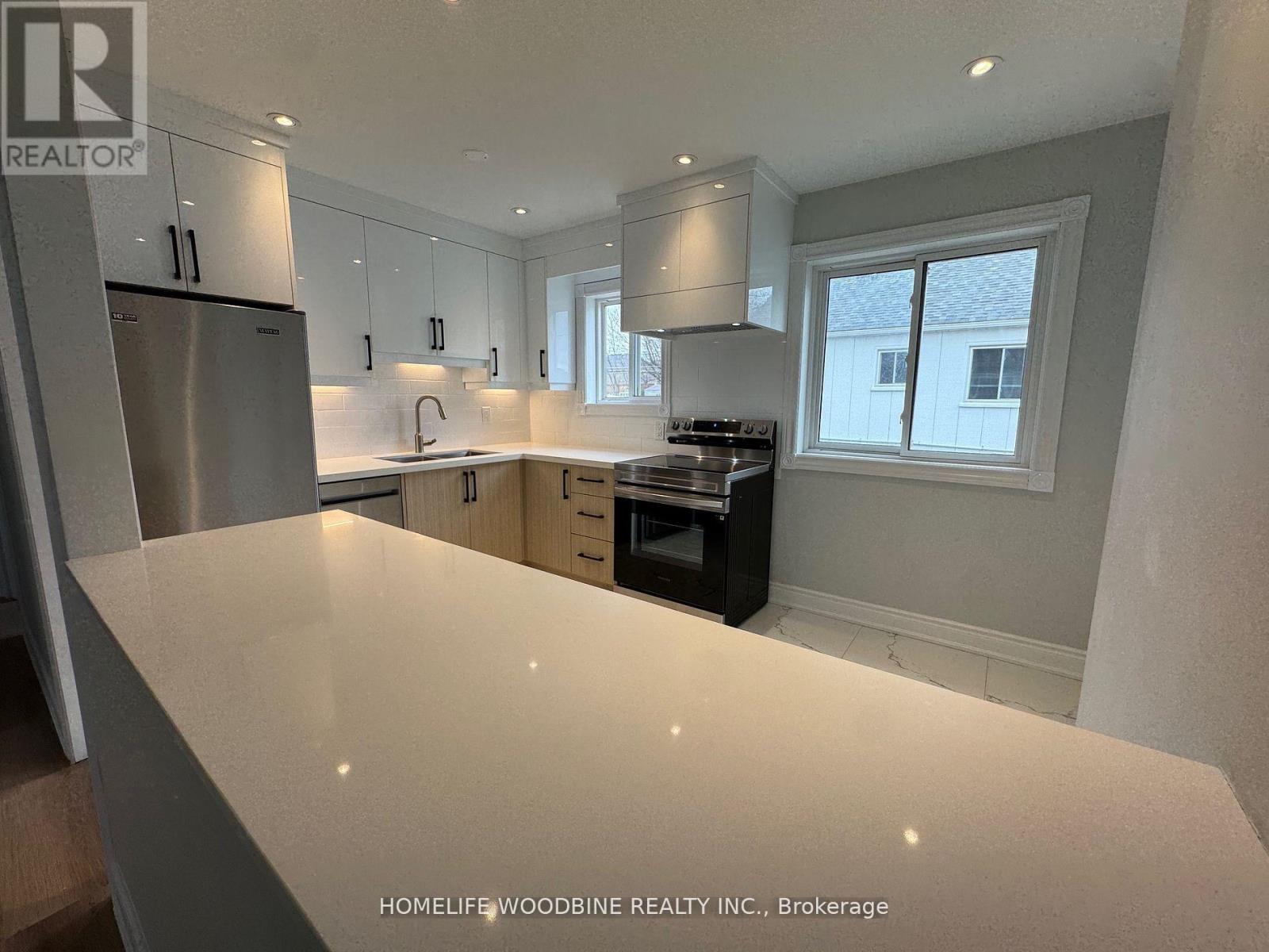 Main Floor - 11 Densmore Avenue, Toronto, Ontario  M9W 1V3 - Photo 6 - W12460822
