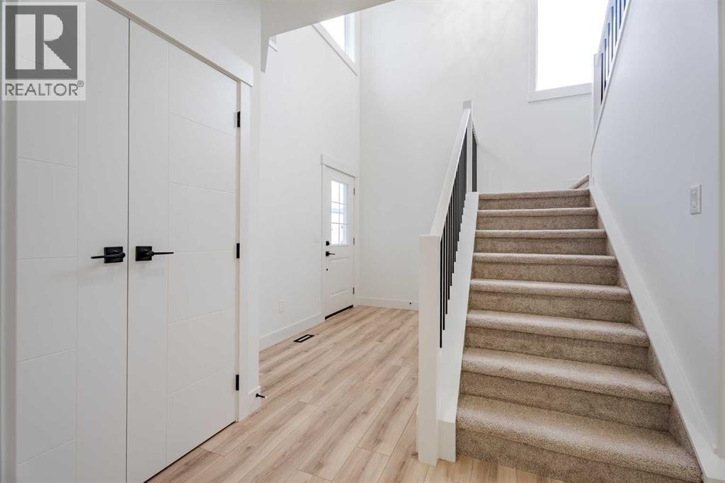 1433 Scarlett Ranch Boulevard, Carstairs, Alberta  T0M 0N0 - Photo 8 - A2236105