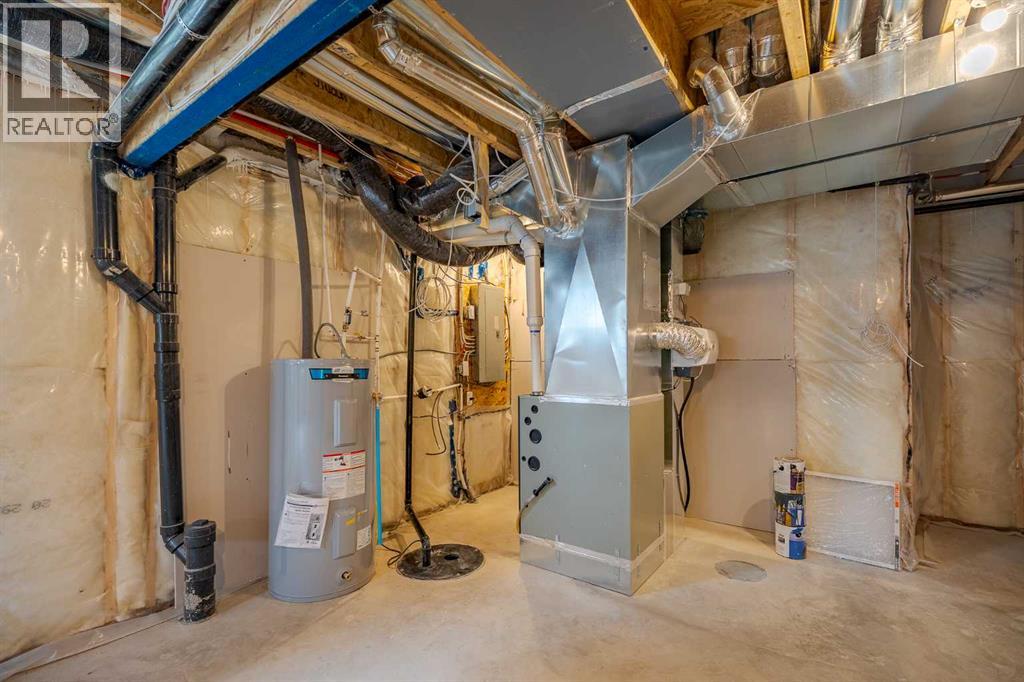 1433 Scarlett Ranch Boulevard, Carstairs, Alberta  T0M 0N0 - Photo 29 - A2236105