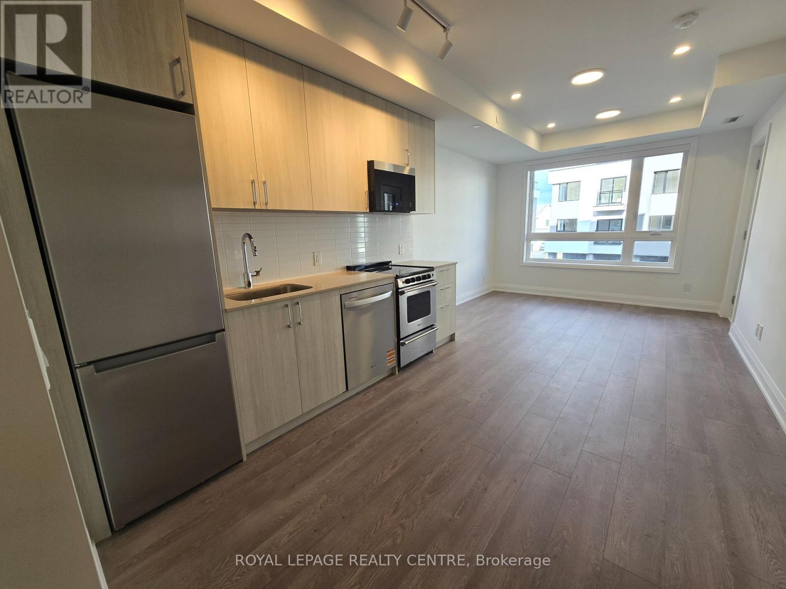 217 - 3250 Carding Mill Trail, Oakville, Ontario  L6M 1L3 - Photo 4 - W12460677
