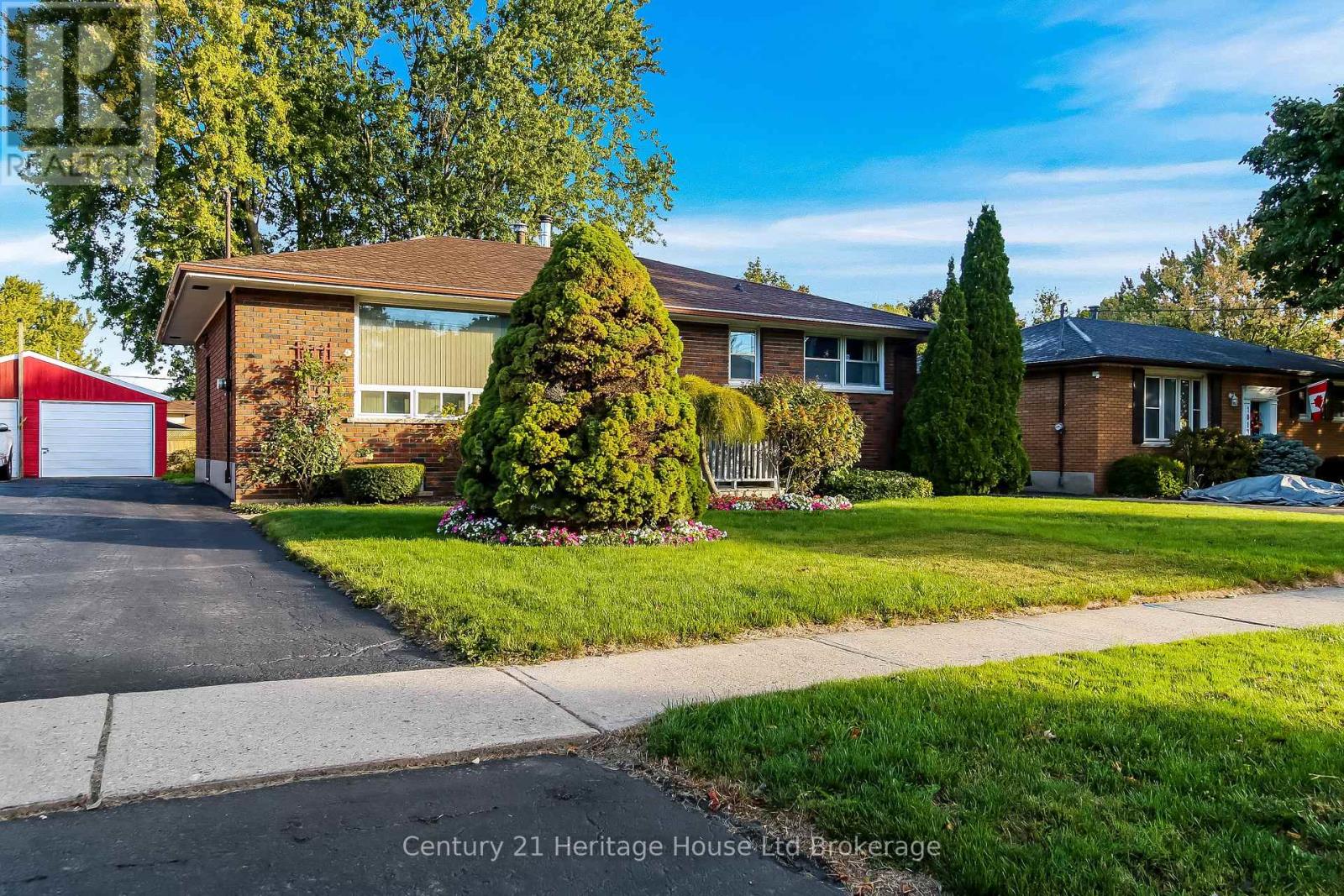 1009 Warwick Street, Woodstock, Ontario  N4S 4S3 - Photo 1 - X12461142