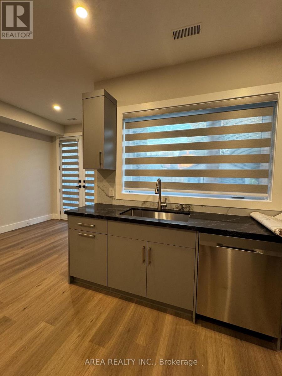 Main - 501 Northcliffe Boulevard, Toronto, Ontario  M6E 3L4 - Photo 3 - C12461197