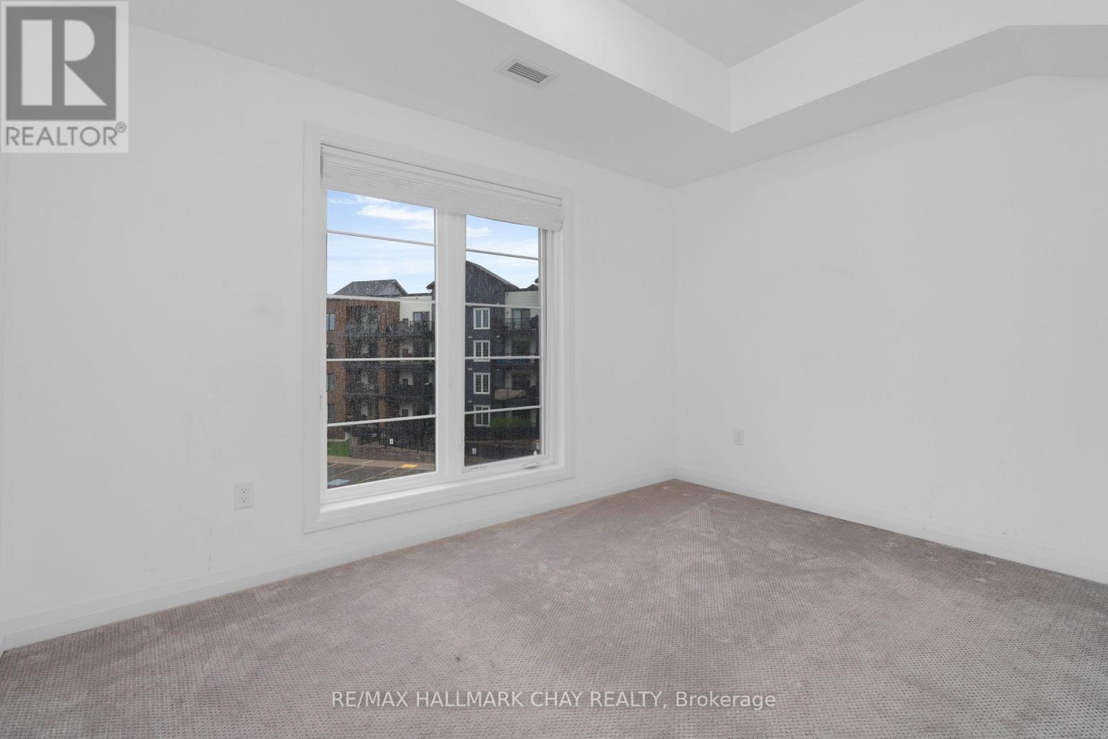 301 - 54 Koda Street, Barrie, Ontario  L9J 0J6 - Photo 21 - S12461128