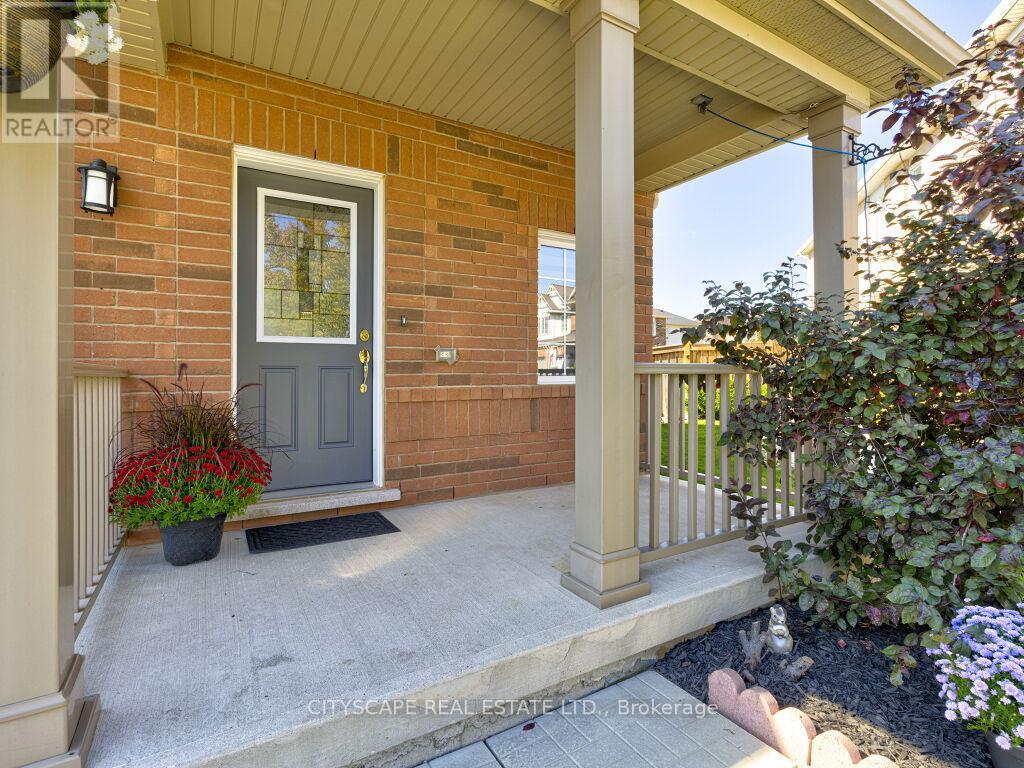 265 Mortimer Crescent, Milton, Ontario  L9T 8N8 - Photo 4 - W12461112